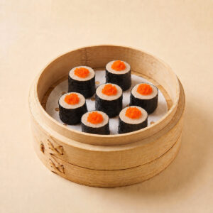 Close-up shot of steaming hot flying fish roe pork seaweed roll showcasing brilliant orange tobiko on top